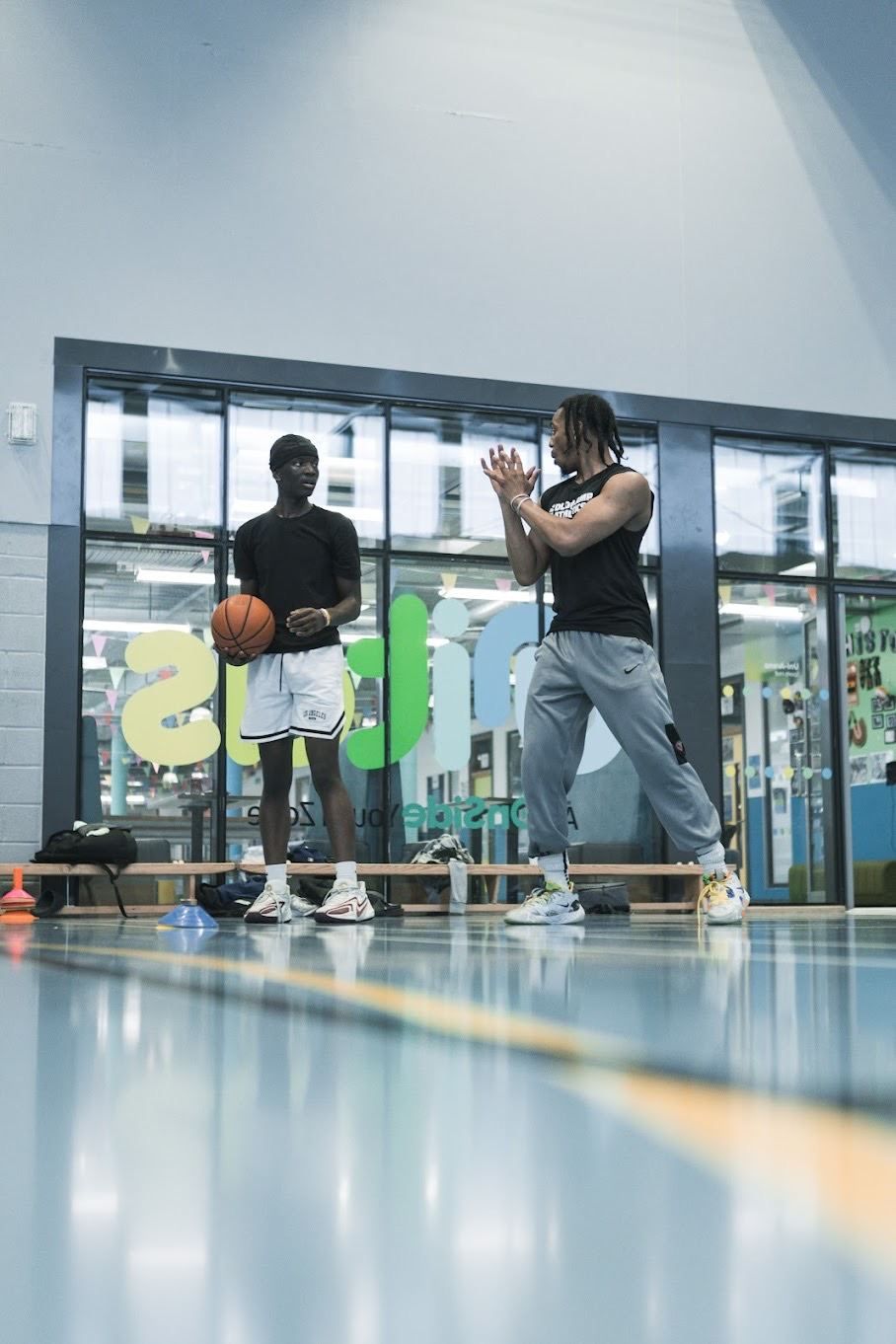 Daniel coaching a young player at Unitas Youth Zone
